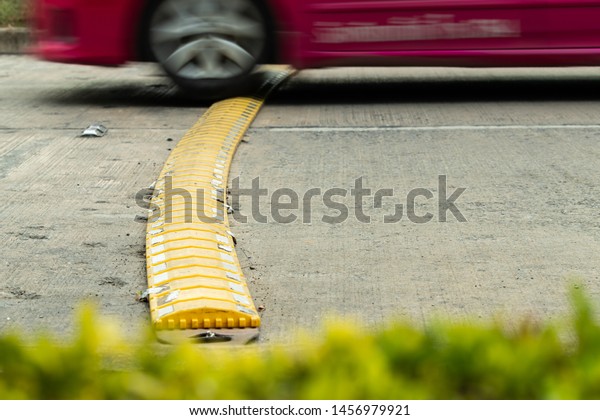 Car running through the barrier on the road,\
slowing down to prevent\
accidents.