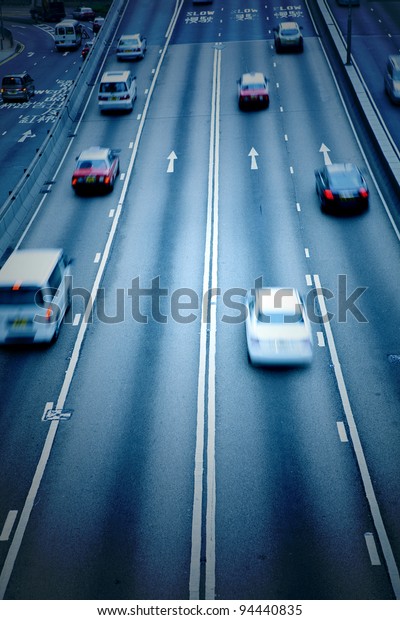 car rushing on the
street in motion blur