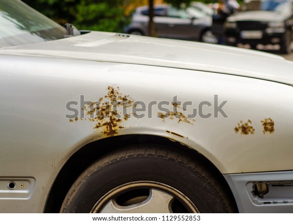 Car rust on the street\
repairing tint