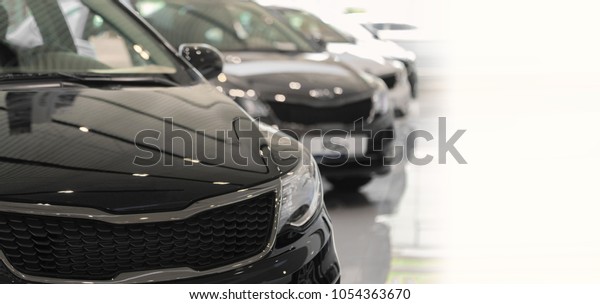 Car sales.\
Automobile in sales salon. Market\
place