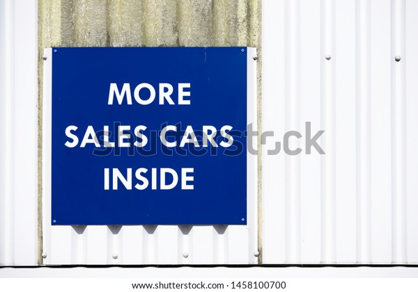 Car sales\
sign at commercial garage business\
uk