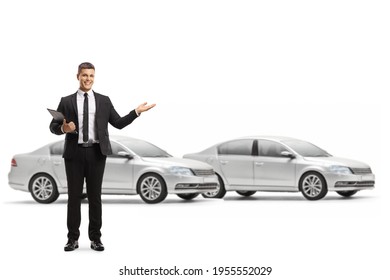 Car Salesman Showing A New Cars Isolated On White Background