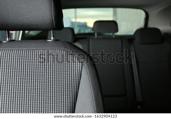 Car seat with\
grey upholstery, closeup\
view