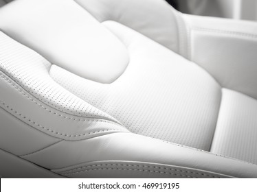 Car Seat In Modern Luxury Comfortable Car With The White Perforated Leather 