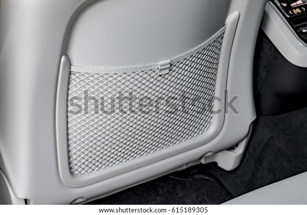 Car seat net for holding\
documents