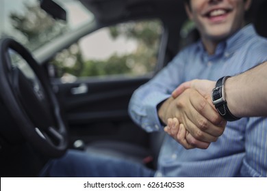 Car Seller And Client Handshake