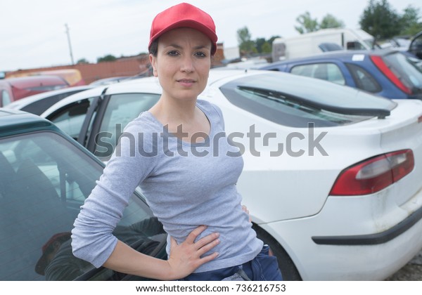 car seller with car in a
motor show