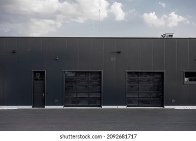 The car service building with two entrances to a garage