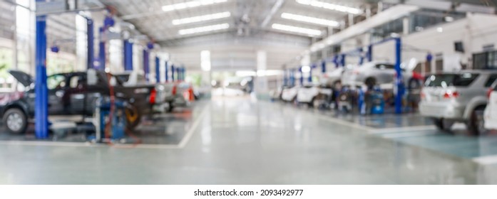 car service centre auto repair workshop blurred panoramic background