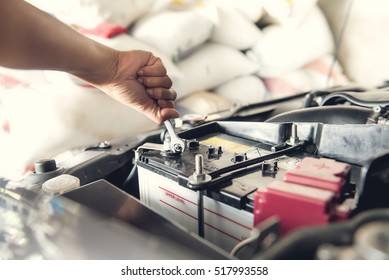 Car Service ,fitting A Car Battery With Wrench 