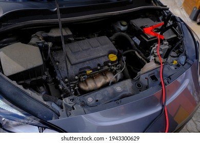 Car Service Inside. Open Hood At Service Station Close-up. Car Open Bonnet Top View