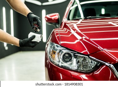 car service worker applying nano 260nw 1814908301