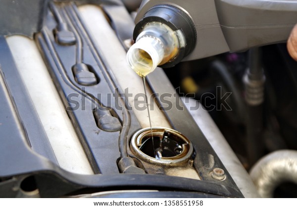 car servicing,\
change oil in the car\
engine