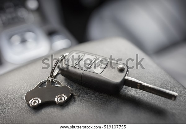 Car shape keyring and remote control key in\
vehicle interior