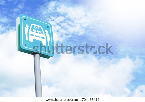 Car sharing parking sign\
over blue sky and clouds. Car sharing service or rental concept.\
Sharing economy and collaborative consumption with copy space,\
blank for text.
