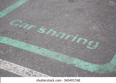 Car Sharing, Sign On Asphalt.