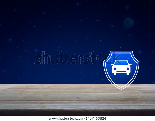 Car with\
shield flat icon on wooden table over fantasy night sky and moon,\
Business automobile insurance\
concept
