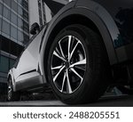 Car showroom. Aluminum wheel with Tire. automobile wheel tire. aluminium rims. Motor Corporation is Japanese automotive manufacturer.