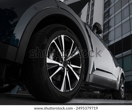 Car showroom. Aluminum wheel with Tire. automobile wheel tire. aluminium rims. Motor Corporation is Japanese automotive manufacturer.