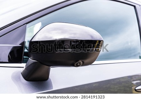 Car Side Mirror With Camera Driver Assistance System And Turn Signal Close Up
