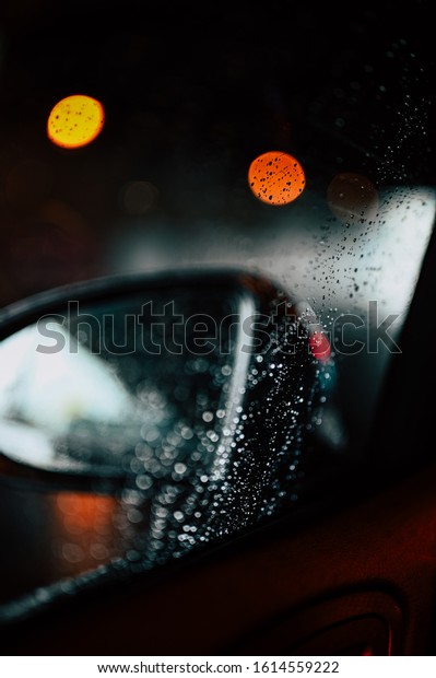 Car side mirror. Rainy day\
bokeh
