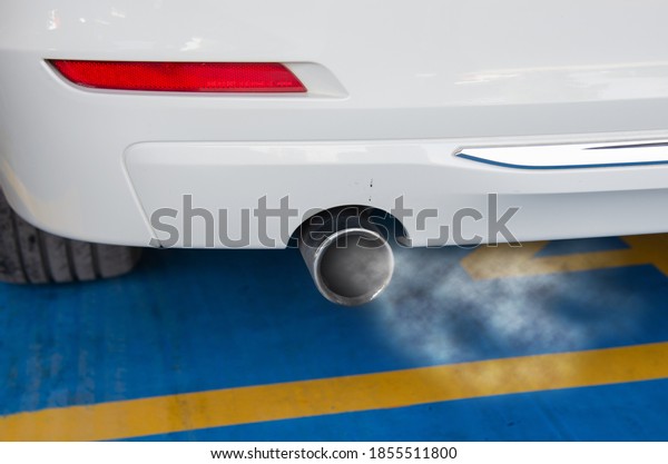 Car smog\
and air pollution from the exhaust\
pipe.