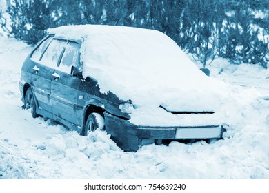 Car in the snow during a blizzard