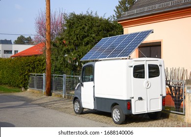 Car With Solar Panel Battery On The Roof