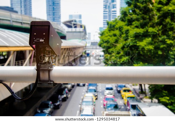 Car\
speed cameras are mounted on the highway to control violations,\
driving faster than the rate specified in the\
city.\
