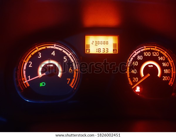 Car speed, high\
mileage and warning lights.