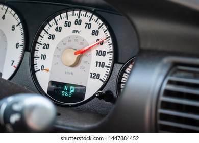 A Car Speedometer At 90 Mph.