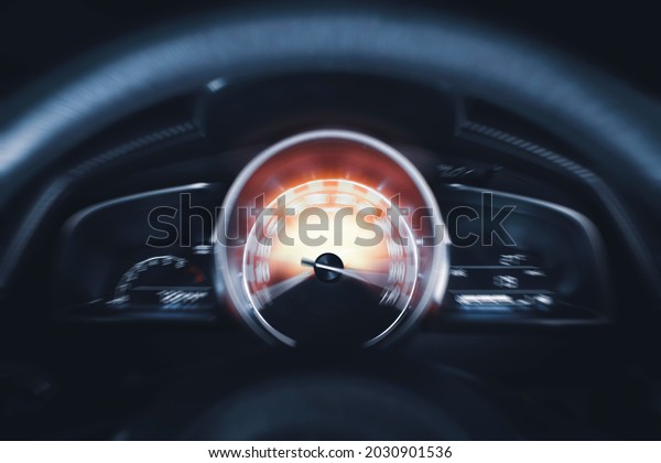 Car speedometer high performance and indicator\
sweeping to max power speed,dashboard car motion,double exposure\
automotive concept