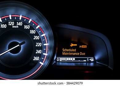 Car speedometer with information display - Scheduled Maintenance Due