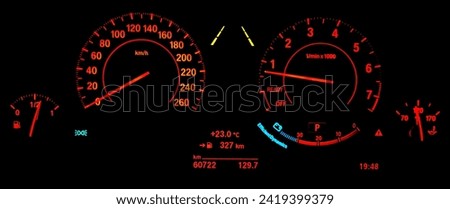 car speedometer on black background
BMW dashboard isolated on black background

