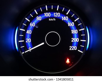 The car speedometer screen has a blue light to help with vision. And the warning symbol for the seat belt display - Powered by Shutterstock - Get 15% off with code: PIKWIZARD15