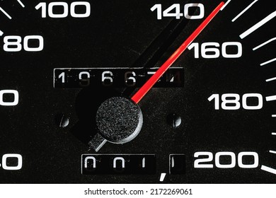 Car speedometer,Car dashboard,Arrow of tachometer,odometer,tachometer arrow is red.Close up.