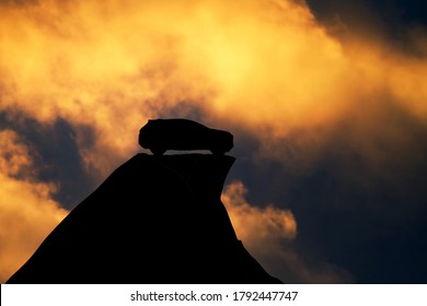 Car Standing On Edge Of The Cliff