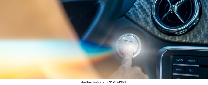 Car Start Stop System With Woman Finger Pressing The Button - Auto Engine Start-stop Button For Keyless Entry - Automotive Industry Concept - Selective Focus
