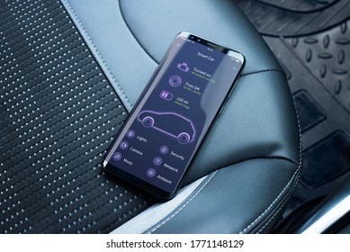 Car Status Information On The Mobile App. Flat App Design Concept. Phone Placed On The Car Seat