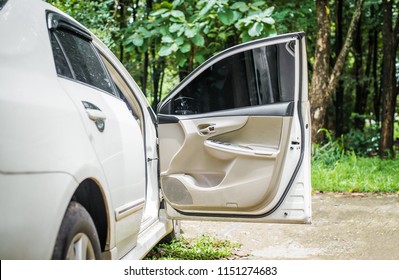 Car Stoped With Open Door In Park Garden