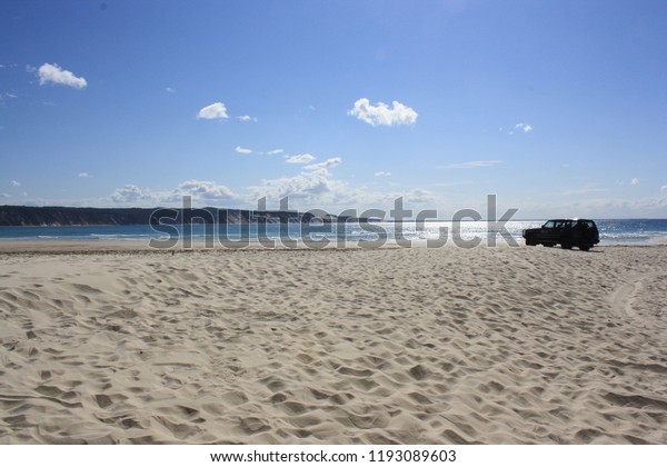 Car stranded on the\
beach