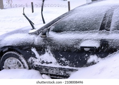 Car Stranded In Snow With Wipers Up