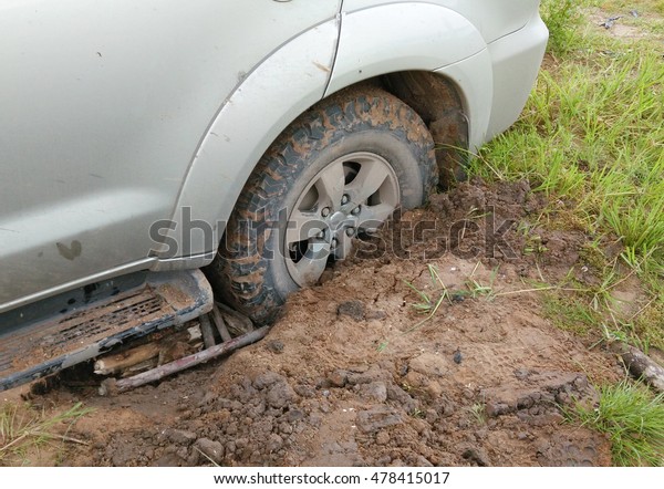 Car Stuck in the\
mud.