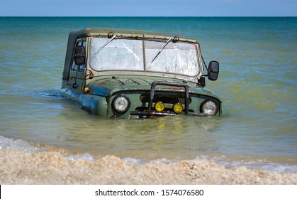 Car Stuck Mud Or Submerged In Sea Water On Beach Ocean Or Sea