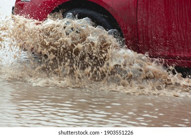 Car Stuck In The Mud, Car Wheel In A Dirty Puddle, Rough Terrain