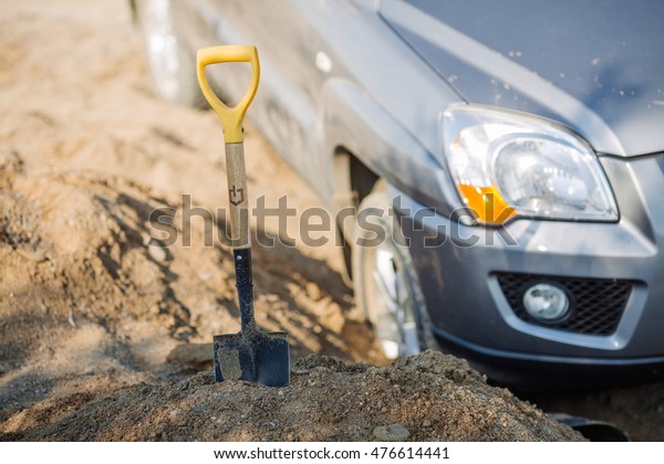 car stuck in the\
sand
