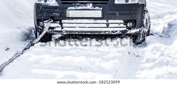 car stuck in the snow, the concept of winter\
snow and breakage