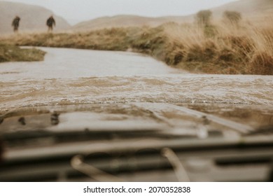 Car Stuck In Water View From The Driver And People Coming To Rescue