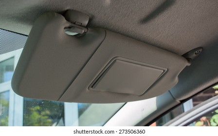 Car Sun Visor In The Down Position