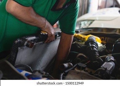 Car Technicians Is Changing The New Radiator In The Car, Car Repair Service Concept